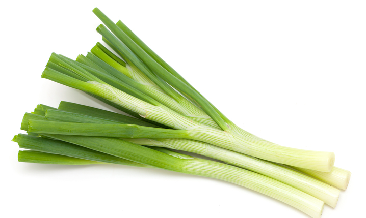 a bunch of spring onions