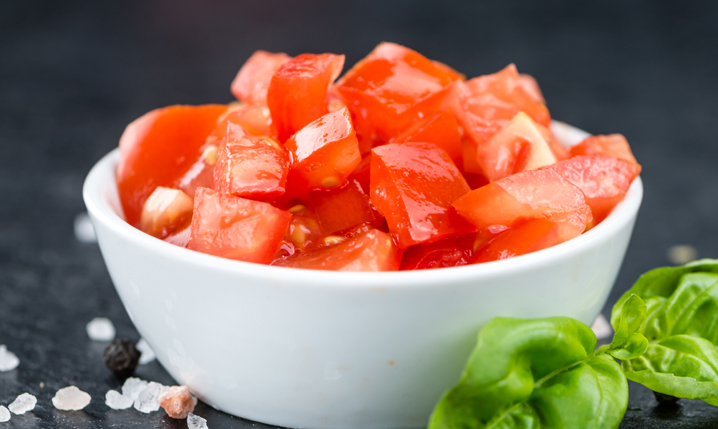 a bowl full of fresh diced tomatoes