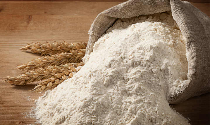a sack full of wheat flour on a table