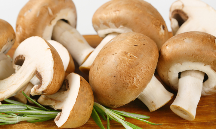 whole and diced uncooked or raw cremini mushrooms
