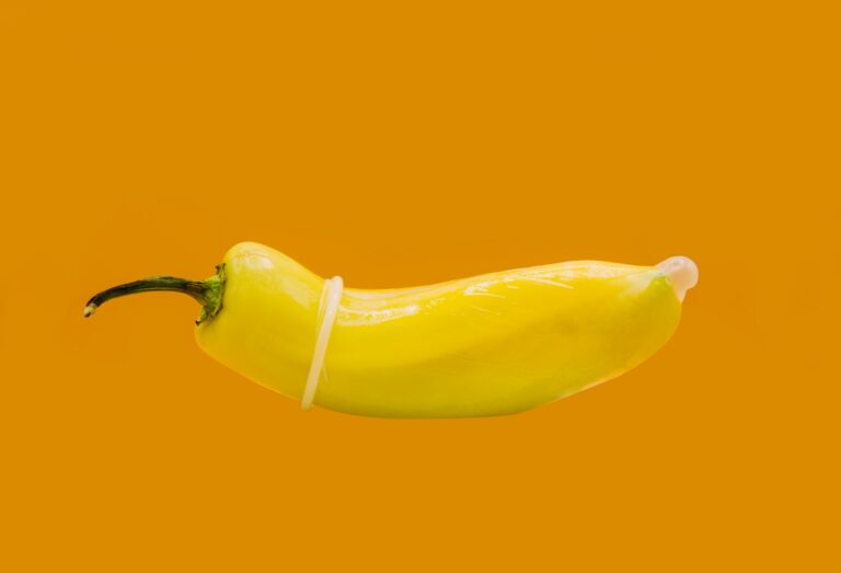 a single yellow banana pepper