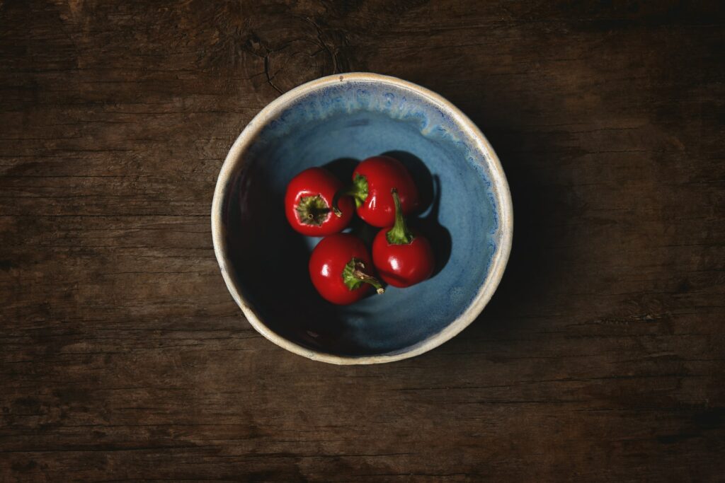 A bowl of cherry peppers
