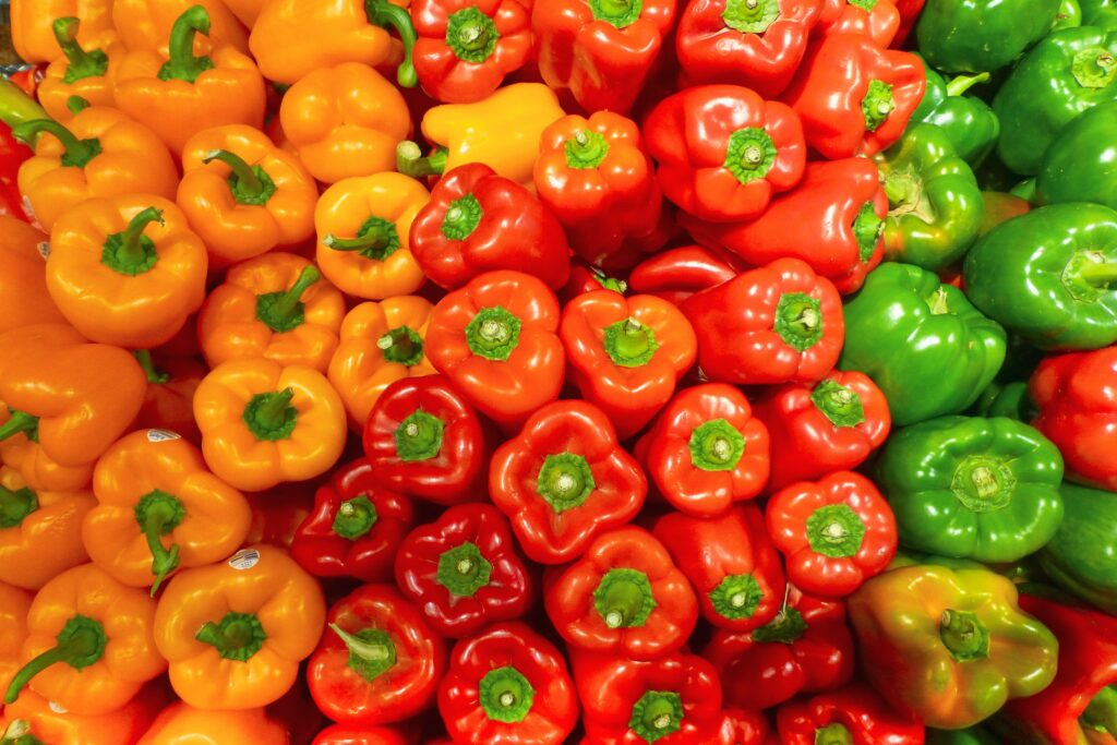 assorted bell peppers including yellow, red, and green